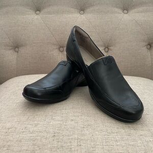 Naturalizer black slip on shoes.